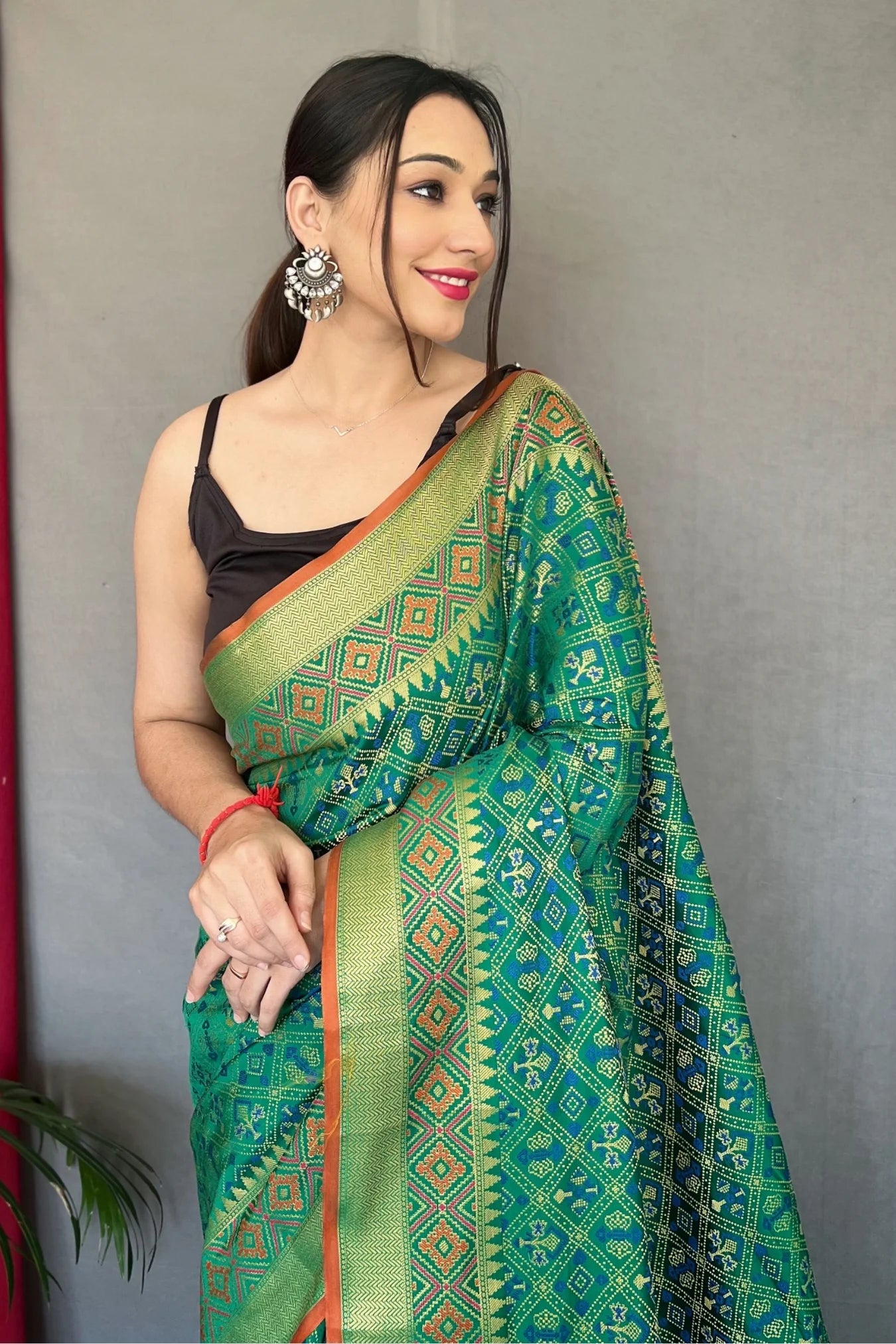 Rama Green Colour Patola Silk Saree 